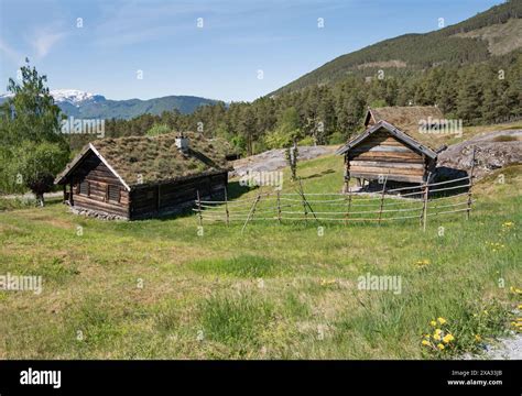 Grass Roofed Wooden Buildings In The Open Air Part Of The Nordfjord