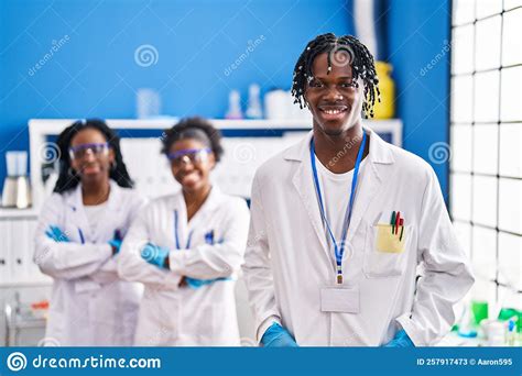 African American Friends Scientists Standing With Arms Crossed Gesture