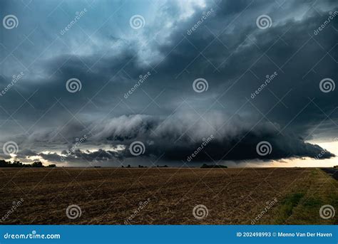 Rotating Wall Cloud Of A Supercell Thunderstorm Over The Plains Stock