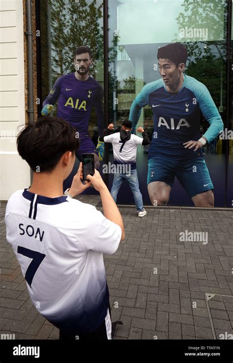 Tottenham Hotspur Fans Take Photos Before The Premier League Match At
