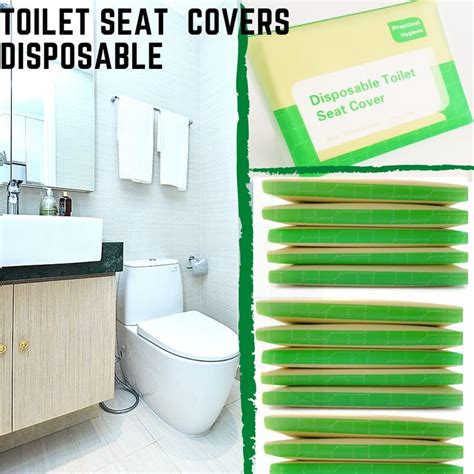 A Bathroom With Green Toilet Seat Covers And Wooden Cabinets