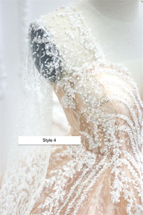 Light Nude Pink Beaded Bodice Long Sleeves Sparkle Ball Gown Wedding Dress With Short Train