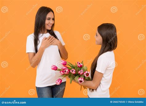 Mothers Day Happy Mother And Daughter With Tulip Flowers Stock Image