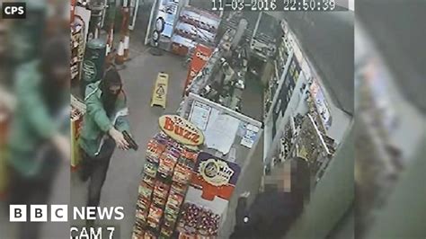 Moment Masked Robber Sprayed Shop Worker With Petrol On Cctv