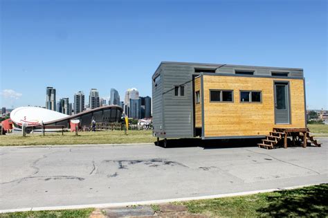 Expanding Tiny House On Wheels With Huge Slide Outs Expands With The Touch Of A Button