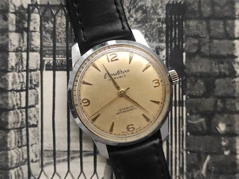 Vintage Omikron Swiss Made Watch 21 Rubis Incabloc Antimagnetic Cal ETA