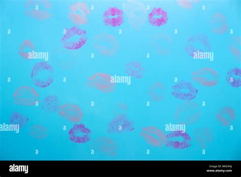 Background From Red Lips Imprint On Blue Background Stock Photo Alamy