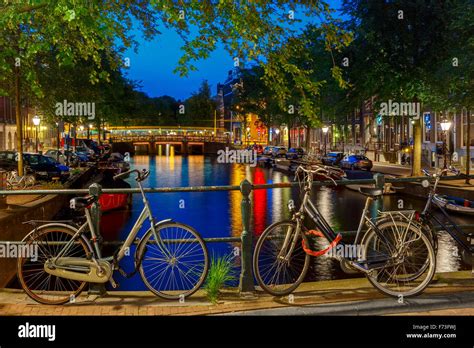 Night City View Of Amsterdam Canal And Bridge Stock Photo Alamy