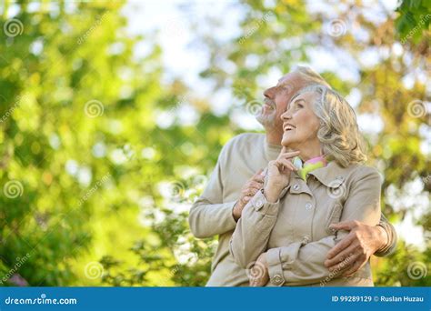 Caucasian Senior Couple In The Park Stock Image Image Of Pleasure