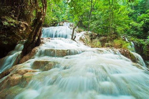 Blue stream waterfall stock image. Image of motion, heaven - 27750263