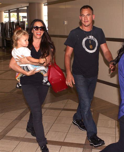 Mario Treadway in Alanis Morissette And Family Departing On A Flight At LAX - Zimbio