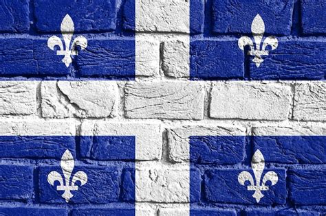 Premium Photo | Flag of quebec on the wall