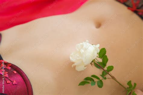 Fresh White Fragrant Rose On The Woman S Naked Body In Lingerie Erotic Evening In The Bedroom