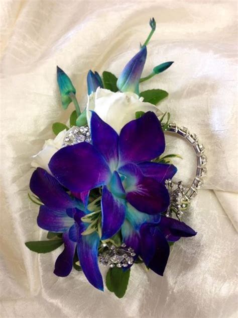 Wrist Corsage Blue Dendrobium Orchids White Majolika Spray Roses