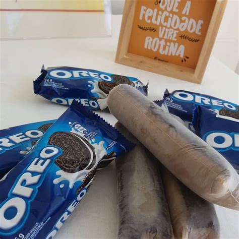 An Assortment Of Oreo Bars On A Table With A Sign In The Background