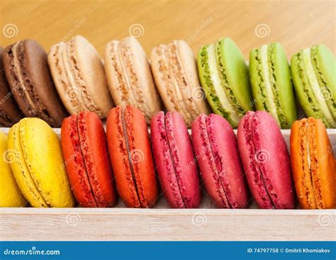 Row Of Traditional French Colorful Macarons In A Box Stock Photo