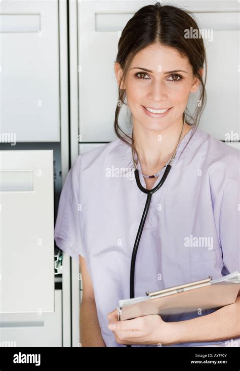 Female Doctor Holding Chart Stock Photo Alamy