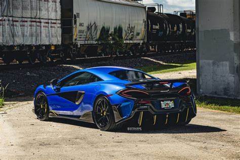 This Mclaren 600lt Really Stands Out Thanks To Its Blue Paint And Black Wheels Carscoops