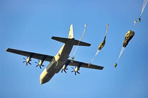 U S Army Paratroopers Jump Out Of A U S Air Force C Hercules