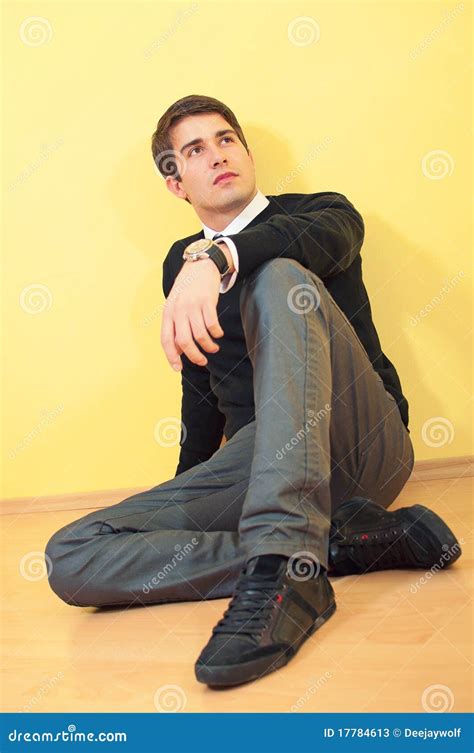 Relaxed Young Man Sitting On The Floor Stock Image Image Of Sitting