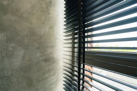 Premium Photo Window Blind Shutter With Light Shadow And Concrete Wall