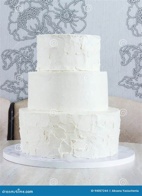 Naked Three Tiered Cake Without Ornaments On The Table Stock Photo Image Of Decorated Cream