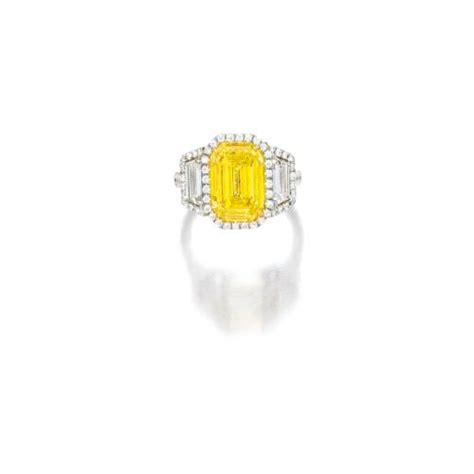 Fancy Intense Yellow Diamond And Diamond Ring Set With A Cut Cornered