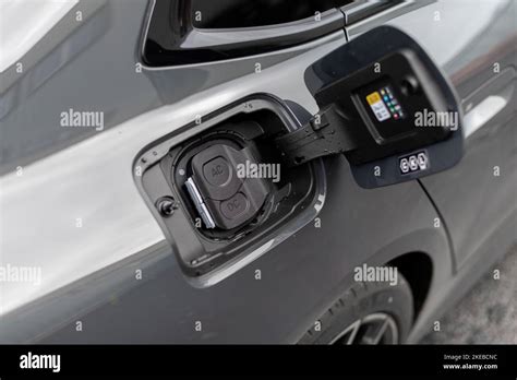 Close Up Of Electric Vehicle AC And DC Charge Port Options On Modern