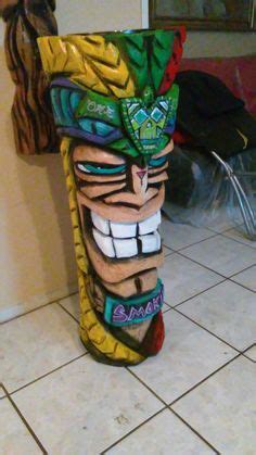 13 Ideas De Pintar Un Tronco De Madera Como Totem Estatuas Tiki