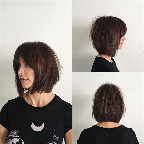 Rich Brunette Soft Layered Bob With Curtain Bangs And Undone Straight