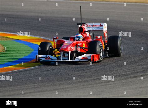 Fernando Alonso Esp Driving The Ferrari F Formula One Racing Car In