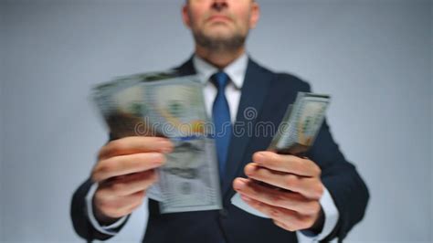 Formally Dressed Man Is Counting Us Dollar Bills Close Up Stock Video