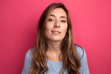 Free Photo Young Beautiful Woman In Blue T Shirt Looking At Camera