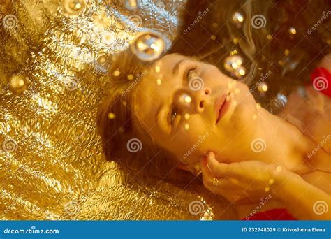 Beautiful Girl With Long Hair Underwater In The Swimming Pool Young