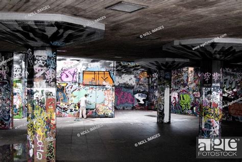 Graffiti Artist Inside Empty Warehouse With Graffiti-Covered Walls, Stock Photo, Picture And ...