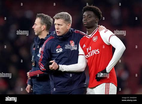 Arsenal Assistant Coach Steve Round With Bukayo Saka During The Premier