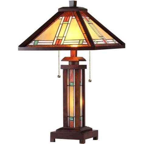 A Table Lamp With A Stained Glass Shade On The Top And Bottom Part Of It