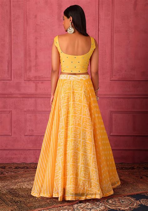 Buy Women Light Yellow Bandhani Print Lehenga Set With Embroidered