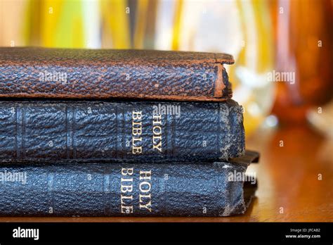 Holy Bibles Stacked Stock Photo Alamy