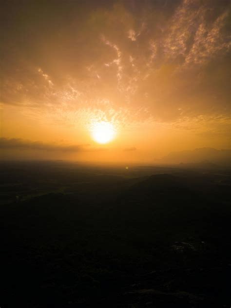 A Grass Field during Sunset · Free Stock Photo