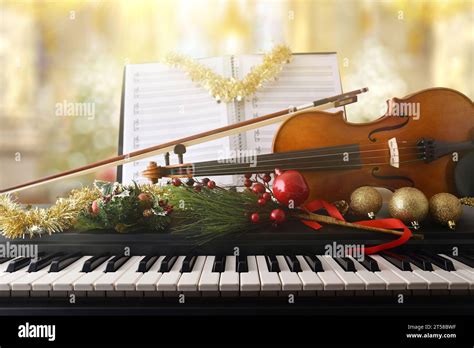 Christmas Religious Music Concept With Piano And Violin With Christmas