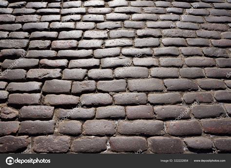 Old traditional stone sett paving. Stock Photo by ©troyka 322222854