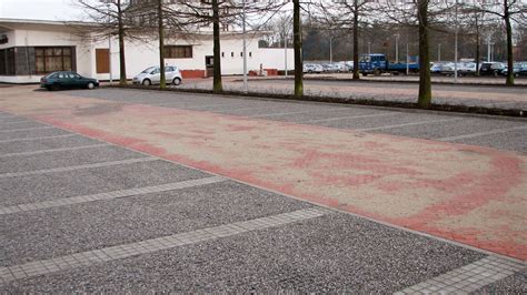 Gravel Filled Ecogrid Car Park Next To Red Block Paving Pathway Ecogrid