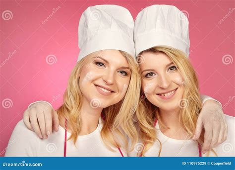 Pretty Blonde Twins Posing For Double Portrait As Bakers Stock Image Image Of Culinary