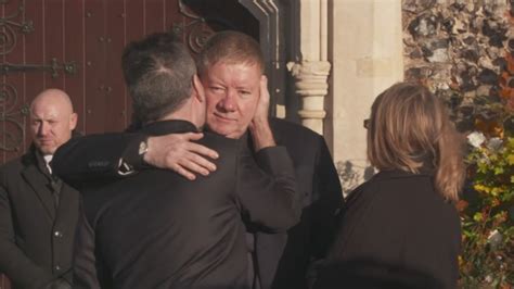 Simon Cowell Hugs Geoff And Karen Payne