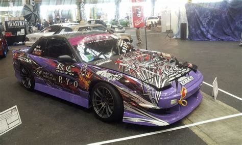 purple drift car   parking lot