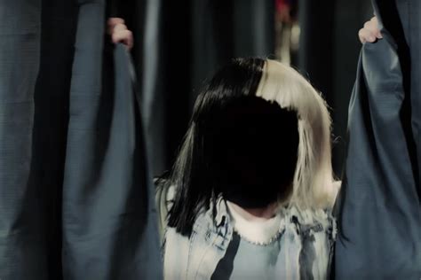 Sia's 'Move Your Body' Video Explores The Origin Story of Her Two-Toned Wig