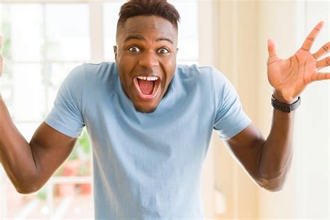 Premium Photo African American Man Screaming Very Excited And