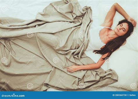 Beautiful Brunette Lying On Bed At Home Stock Photo Image Of Pleasure