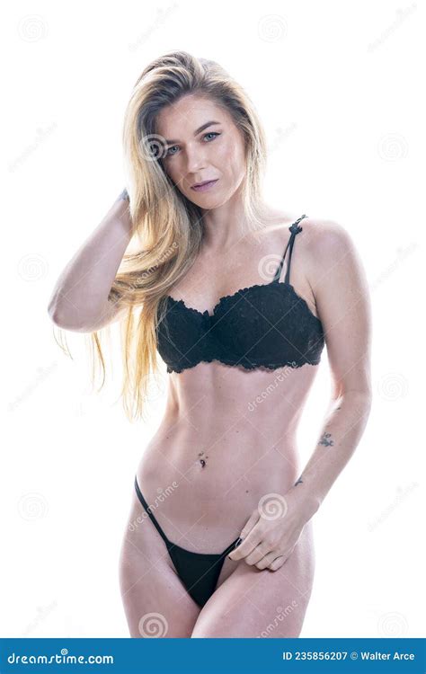 Blonde Lingerie Figure Model In A Studio Environment Stock Image